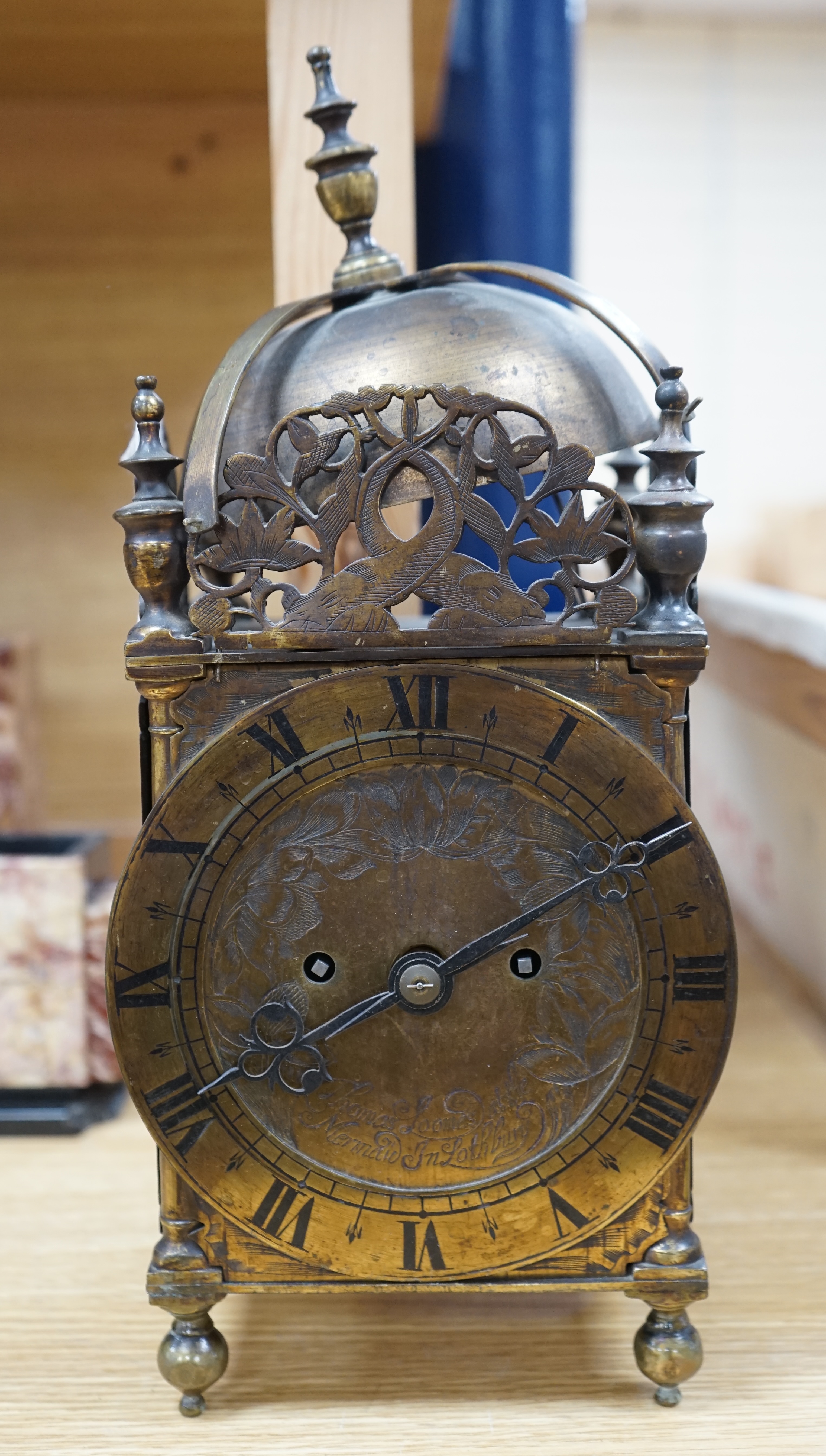 A Victorian lantern clock, Thomas Loomes at the Mermaid in Lothbury to the dial plate, twin fusee movement, 35cm high. Condition - fair, parts detached